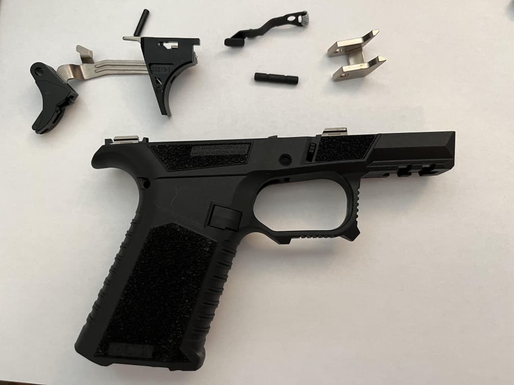 Selection of Polymer 80 frame kits displayed in multiple colors for compliant customization use